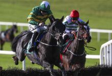 Darasso ridden by Luke Dempsey (left) jumps the last in the Lismullen Hurdle