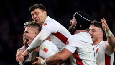 Freddie Steward Celebrating His First England Try Alongside His Teammates