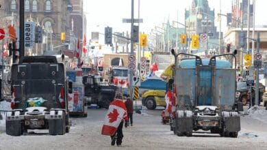 Truckers end US border blockade, siege in Ottawa goes on