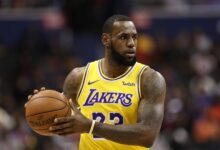 LeBron James, a leader in All-Star voting, handles the ball for the Los Angeles Lakers.