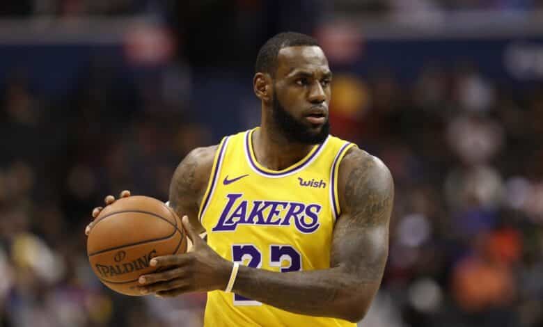 LeBron James, a leader in All-Star voting, handles the ball for the Los Angeles Lakers.