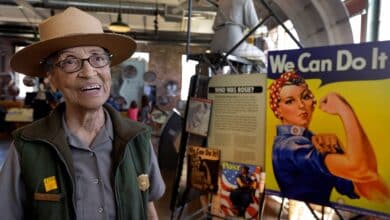 FILE - National Park Service Ranger Betty Reid Soskin smiles during an interview at Rosie the Riveter World War II Home Front National Historical Park in Richmond, Calif., July 12, 2016. Soskin, the nation's oldest active park ranger, is hanging up her smokey hat at the age of 100. She retired Thursday, March 31, 2022, after more than 15 years at the park, the National Park Service announced. Soskin "spent her last day providing an interpretive program to the public and visiting with coworkers," a Park Service statement said. (AP Photo/Ben Margot, File)