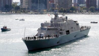 FILE - The USS Detroit, a Freedom-class of littoral combat ship, arrives Friday, Oct. 14, 2016, in Detroit. The Navy that once wanted smaller, speedy warships to chase down pirates has made a speedy pivot to Russia and China and many of those ships, like the USS Detroit, could be retired. The Navy wants to decommission nine ships in the Freedom-class, warships that cost about $4.5 billion to build. (AP Photo/Carlos Osorio, File)