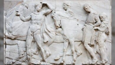 The Elgin Marbles stolen from Greece. From left to right we see a horse, a naked Greek man leading the way, whilst looking back at the others. Then there